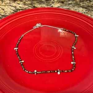 Trades of Hope turquoise-like stones with little silver charms